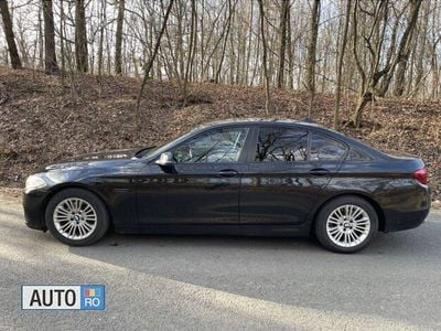 Second-hand BMW 518 Comfort Edition 184 CP (135 kW) 2014 Negru Berlinǎ