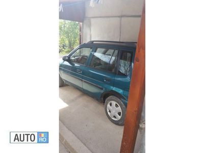 Second-hand Mazda Demio 46 CP (33 kW) 1998 Verde Hatchback