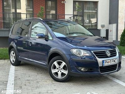 Culoarealbastru Second-hand 2009 VW Touran Monovolum | 3.490 EUR (Preț bun)