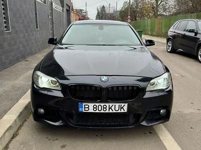 Second-hand BMW 520 184 CP (135 kW) 2011 Negru Berlinǎ
