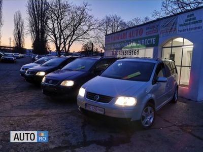Second-hand VW Touran 105 CP (77 kW) 2006 Argintiu Monovolum
