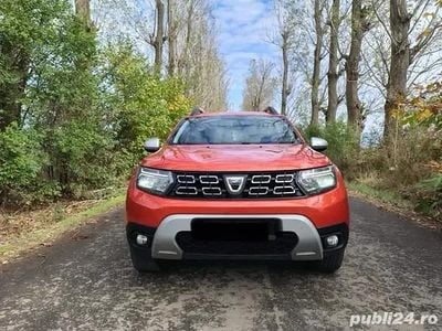 Second-hand Dacia Duster 96 CP (70 kW) 2021 Portocaliu SUV