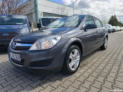Second-hand Opel Astra 115 CP (84 kW) 2009 Maro Berlinǎ