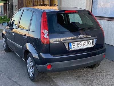 Second-hand Ford Fiesta 75 CP (55 kW) 2007 Albastru Hatchback