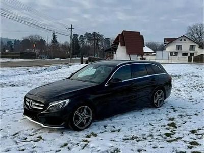 Second-hand Mercedes C220 AMG line 170 CP (125 kW) 2018 Negru Break