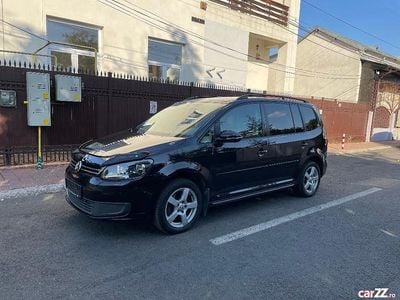 Second-hand VW Touran 150 CP (110 kW) 2012 Negru Monovolum