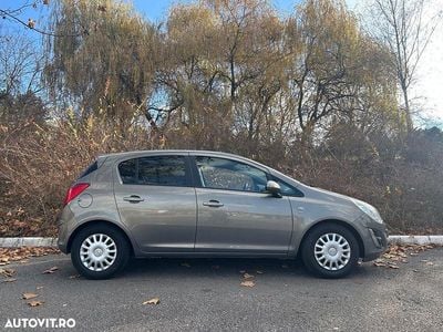 Second-hand Opel Corsa 86 CP (63 kW) 2011 Culoaremaro Hatchback