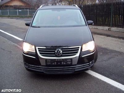 Second-hand VW Touran Highline 170 CP (125 kW) 2008 Culoarenegru Monovolum