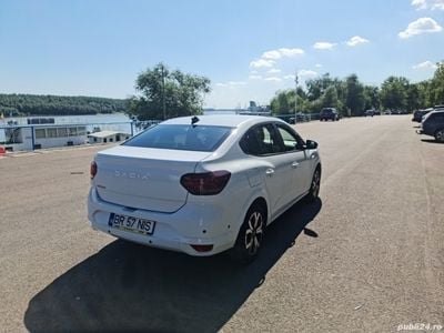 Second-hand Dacia Logan Prestige 100 CP (73 kW) 2023 Alb Berlinǎ