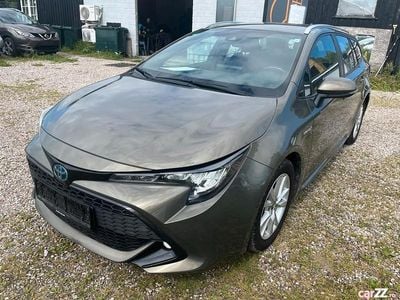 Second-hand Toyota Corolla Hybrid 98 CP (72 kW) 2019 Alte culori Break
