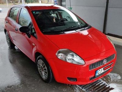 second-hand Fiat Grande Punto 1.4 benzină 77 CP Euro 4 AC geamuri electrice față cauciucuri vara iarna altele