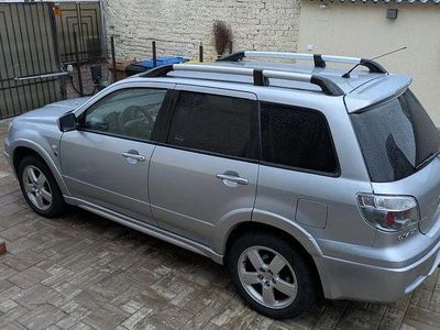 Second-hand Mitsubishi Outlander Intense 160 CP (117 kW) 2006 Culoareargint SUV