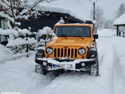 Second-hand Jeep Wrangler 200 CP (147 kW) 2013 Culoareportocaliu SUV