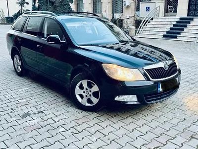 Second-hand Skoda Octavia 105 CP (77 kW) 2011 Negru Break