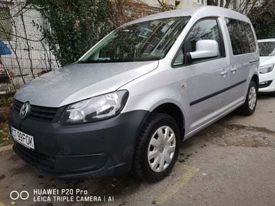 Second-hand VW Caddy Life 105 CP (77 kW) 2012 Argintiu Monovolum