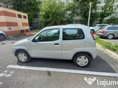 second-hand Suzuki Ignis motor 1300, benzina, 128000 km, decembrie 2001