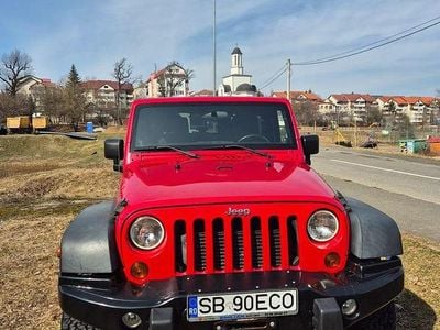 Second-hand Jeep Wrangler 200 CP (147 kW) 2010 Culoarerosu SUV