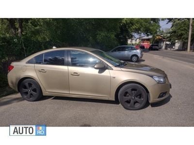 Second-hand Chevrolet Cruze 113 CP (83 kW) 2010 Auriu Berlinǎ