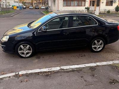 Second-hand VW Jetta 105 CP (77 kW) 2006 Culoarenegru Hatchback