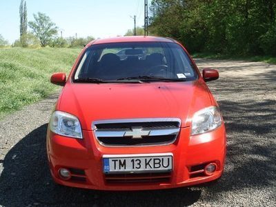 Second-hand Chevrolet Aveo 69 CP (50 kW) 2009 Roşu Berlinǎ