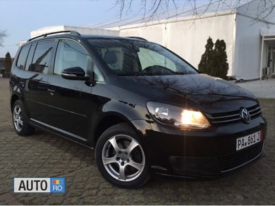 Second-hand VW Touran 105 CP (77 kW) 2011 Negru Monovolum