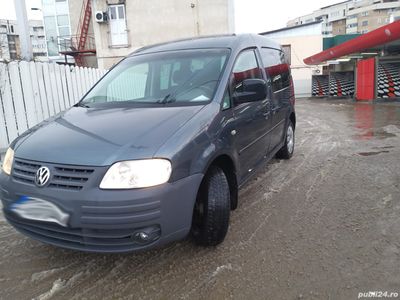 second-hand VW Caddy 2005 usi pe ambele parti