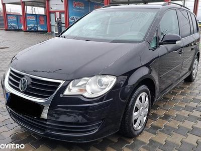 Second-hand VW Touran Highline 105 CP (77 kW) 2008 Culoarenegru Monovolum
