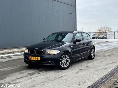 Second-hand BMW 116 122 CP (89 kW) 2010 Culoarenegru Hatchback