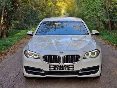 Second-hand BMW 520 184 CP (135 kW) 2014 Berlinǎ