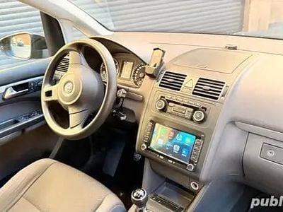 Second-hand VW Touran 110 CP (80 kW) 2012 Monovolum