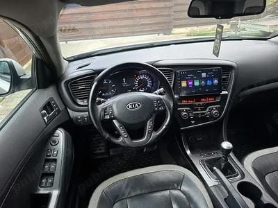 Second-hand Kia Optima 136 CP (100 kW) 2013 Argintiu Berlinǎ