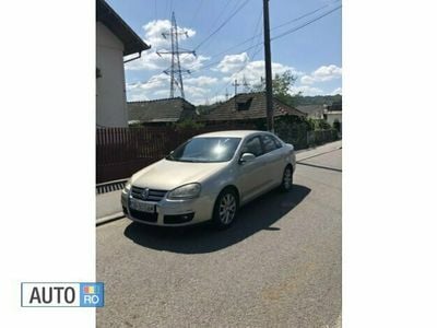 Second-hand VW Jetta 115 CP (84 kW) 2008 Auriu Berlinǎ
