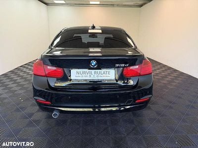 Culoarenegru Utilizat 2012 BMW 318 Comfort Edition Berlinǎ | 9.922 EUR (Preț OK)