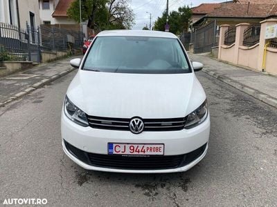 Second-hand VW Touran Comfortline 110 CP (80 kW) 2012 Alb Monovolum