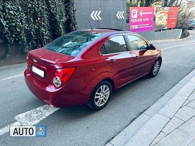 Second-hand Chevrolet Aveo 95 CP (69 kW) 2012 Roşu Berlinǎ