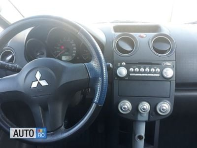 Second-hand Mitsubishi Colt 75 CP (55 kW) 2007 Negru Hatchback