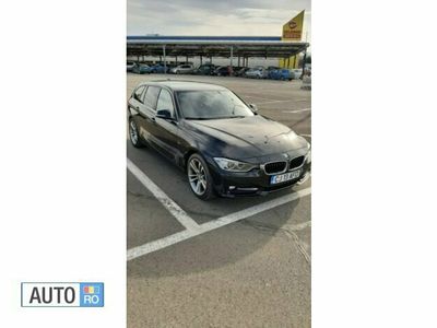 Second-hand BMW 318 Comfort Edition 143 CP (105 kW) 2014 Negru Break