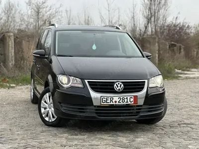 Second-hand VW Touran Freestyle 140 CP (102 kW) 2010 Negru Monovolum