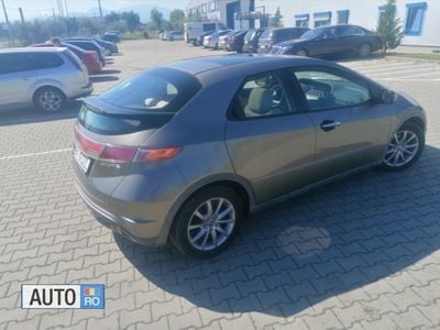 Second-hand Honda Civic 140 CP (102 kW) 2007 Auriu Hatchback