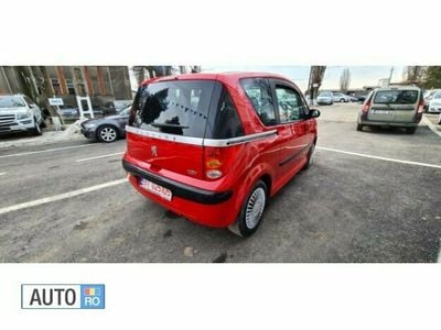 Second-hand Peugeot 1007 74 CP (54 kW) 2005 Rosu Monovolum