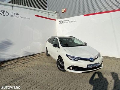 Second-hand Toyota Auris Hybrid 99 CP (72 kW) 2015 Culoarealb Break