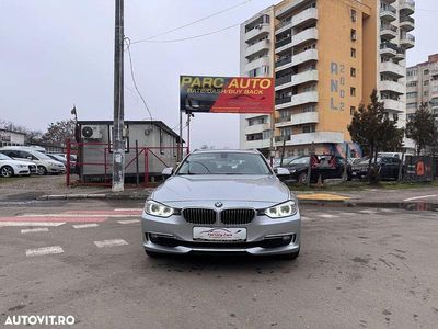 Second-hand BMW 320 Luxury Line 184 CP (135 kW) 2014 Culoareargint Break