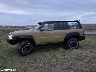 Second-hand Nissan Patrol 160 CP (117 kW) 2005 Culoarebej SUV
