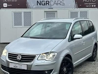 Second-hand VW Touran Highline 170 CP (125 kW) 2007 Argintiu Monovolum
