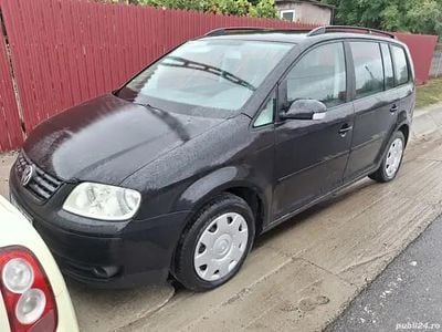Second-hand VW Touran 163 CP (119 kW) 2005 Monovolum