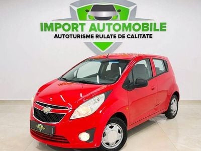 Second-hand Chevrolet Spark LS 68 CP (50 kW) 2011 Rosu Hatchback