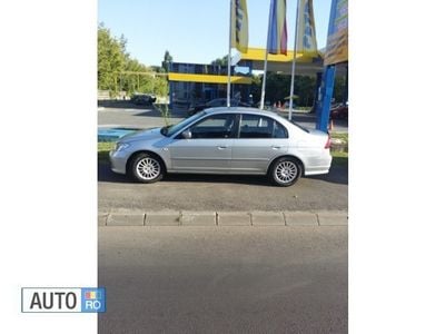Second-hand Honda Civic 110 CP (80 kW) 2004 Argintiu Berlinǎ