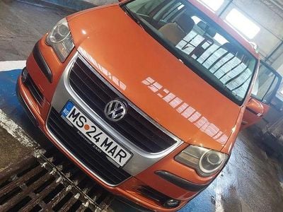 Second-hand VW Touran Cross 105 CP (77 kW) 2008 Culoareportocaliu Monovolum
