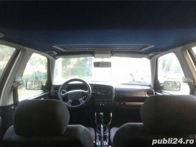 Second-hand VW Golf III 86 CP (63 kW) 1995 Violet metalizat Hatchback