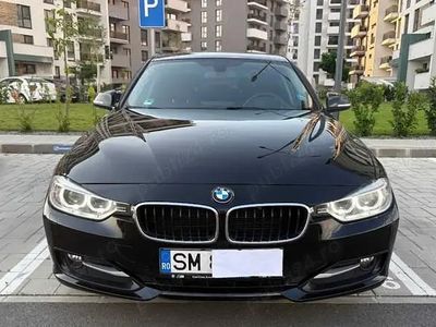 Second-hand BMW 320 Comfort Edition 184 CP (135 kW) 2014 Negru Berlinǎ